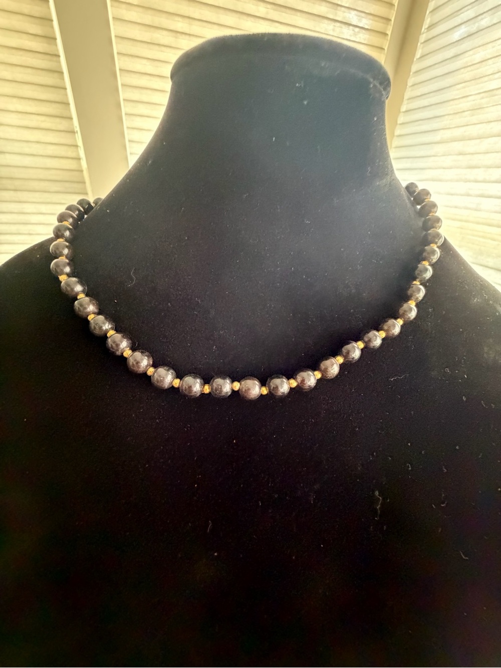 Classic Black Beaded Necklace with Gold Accents